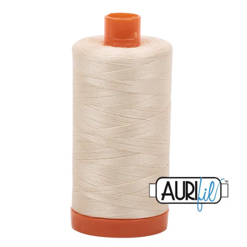 Spool of cream-coloured thread with an orange cap on a white background, featuring the Aurifil logo.