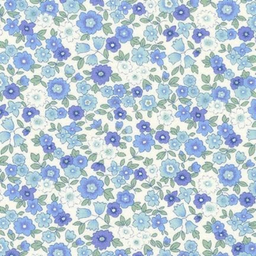 Pattern of small blue flowers on a white background