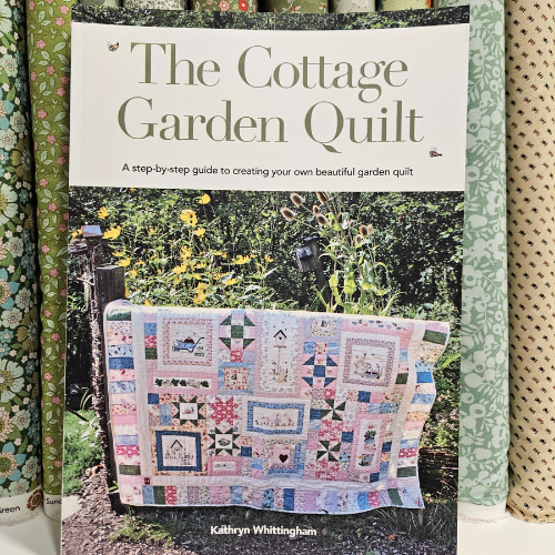 Book titled 'The Cottage Garden Quilt' by Kathryn Whittingham with a quilt photo on the cover.