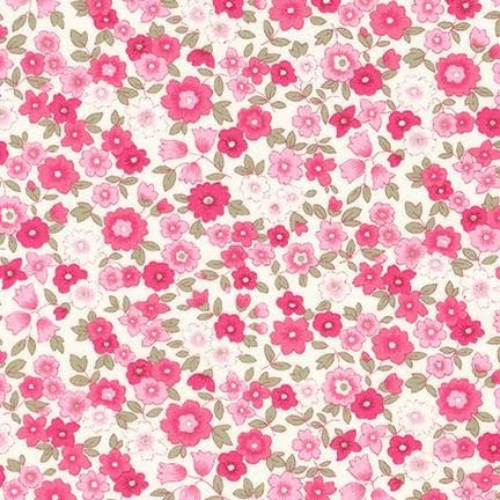 Pattern of small pink flowers on a white background