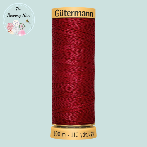 Spool of red Gutermann thread on a light blue background with 'The Sewing Hive' branding.