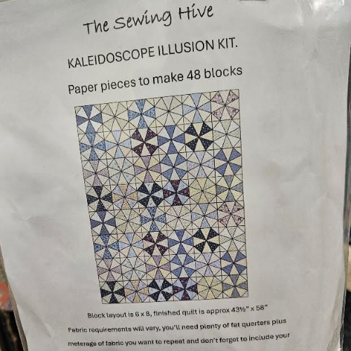 Kaleidoscope illusion kit packaging with geometric pattern and text on a white background