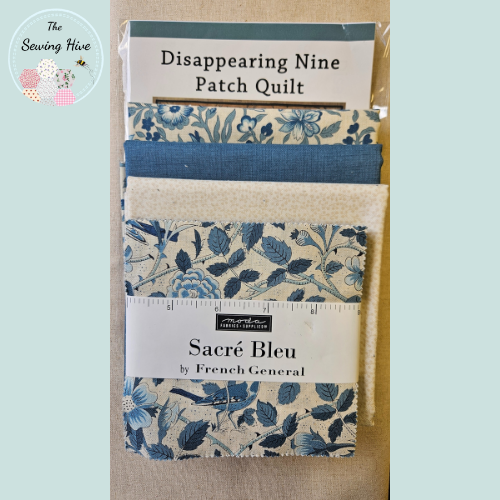 Fabric bundle with 'Disappearing Nine Patch Quilt' and 'Sacre Bleu' labels on a light blue background.